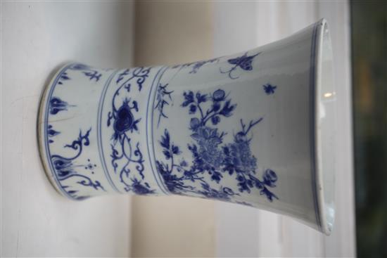 A Chinese blue and white gu-shaped vase or brush pot, Transitional period, mid 17th century, height 24.5cm, diameter 18.5cm, firing cra